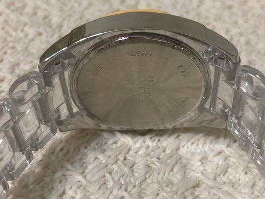 AK Anne Klein Transparent Bracelet Yellow Dial Women's Watch