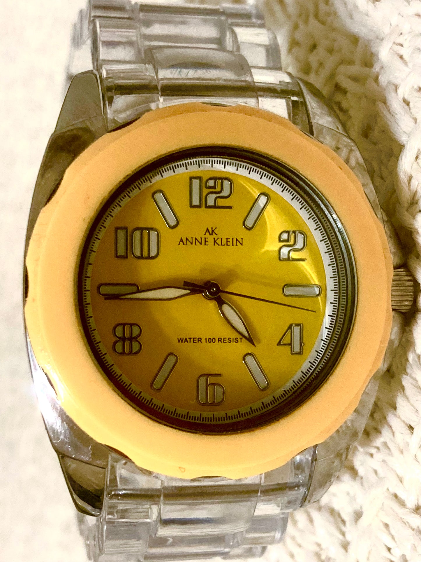 AK Anne Klein Transparent Bracelet Yellow Dial Women's Watch